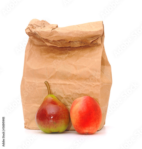 Photo: school lunch bag with fresh fruit on white school lunch bag with fresh fruit on white