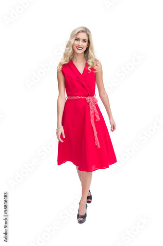 Photo: Cheerful blond woman looking at camera Cheerful blond woman looking at camera