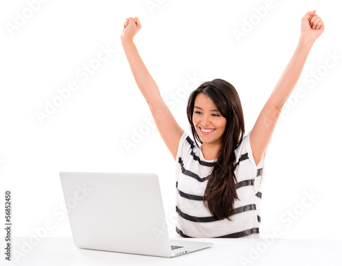 Photo: Successful woman working online Successful woman working online