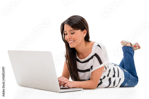 Photo: Woman working on a laptop Woman working on a laptop