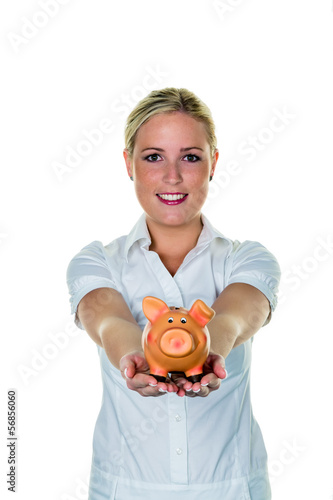 Photo: Frau mit einem Sparschwein Frau mit einem Sparschwein
