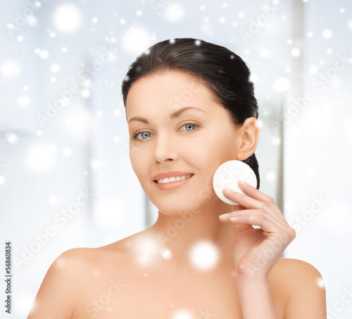 Photo: beautiful woman with cotton pad beautiful woman with cotton pad