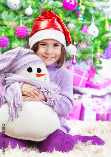 Photo: Little girl on Christmas celebration Little girl on Christmas celebration