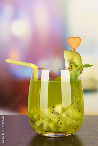 Photo: Tasty cocktail on bright background Tasty cocktail on bright background