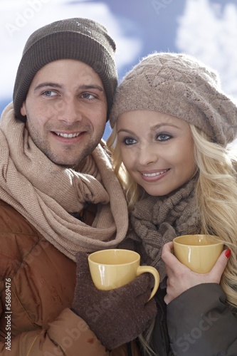 Photo: Closeup photo of loving couple at wintertime Closeup photo of loving couple at wintertime