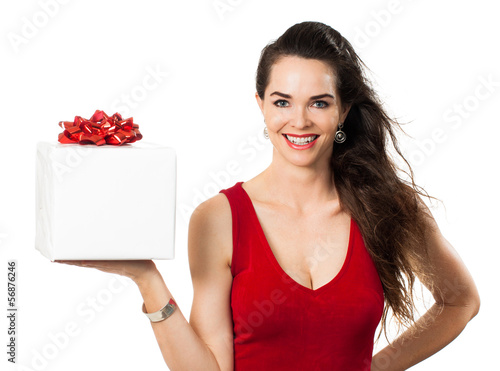Photo: A happy woman holding a gift A happy woman holding a gift