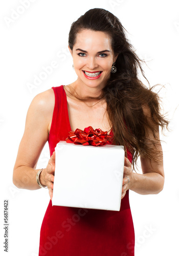 Photo: Beautiful happy woman holding gift Beautiful happy woman holding gift