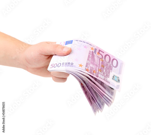 Photo: Man hand holding five hundred euro bills. Man hand holding five hundred euro bills.