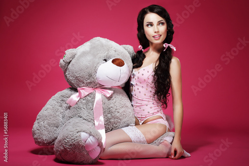 Photo: Sentiment. Valentine. Woman with Soft Toy Sitting. Sensuality Sentiment. Valentine. Woman with Soft Toy Sitting. Sensuality