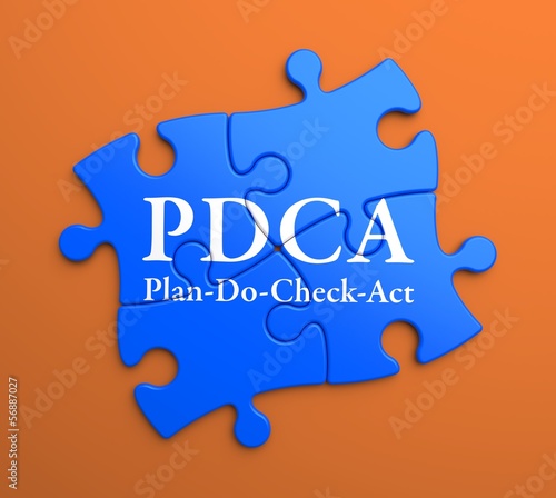 Illustration: PDCA on Blue Puzzle Pieces. Business Concept. PDCA on Blue Puzzle Pieces. Business Concept.