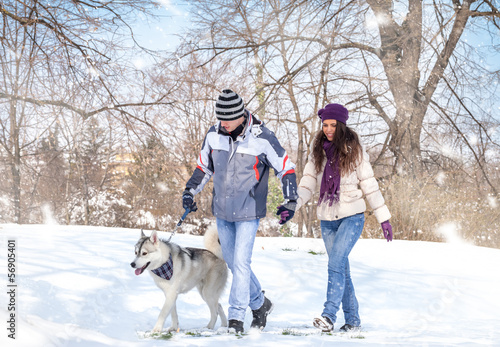 Photo: couple walking his dog couple walking his dog