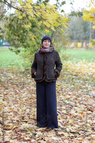 Photo: Woman at autumn park Woman at autumn park
