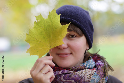Photo: Woman with maple leaf Woman with maple leaf