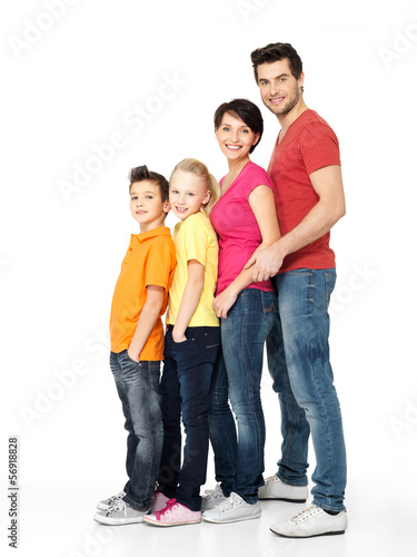 Photo: Happy family with children standing together in line Happy family with children standing together in line