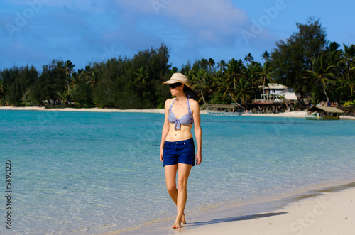 Photo: Young Happy Woman on Vacation in Pacific Island Young Happy Woman on Vacation in Pacific Island