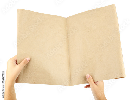 Photo: Newspaper in hands isolated on white Newspaper in hands isolated on white