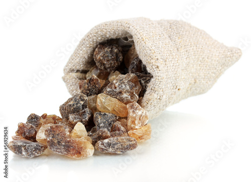 Photo: Caramelized sugar in sack isolated on white Caramelized sugar in sack isolated on white