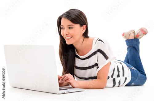 Photo: Woman browsing on a laptop Woman browsing on a laptop