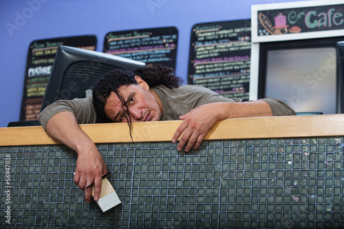 Photo: Tired Cafe Owner Tired Cafe Owner