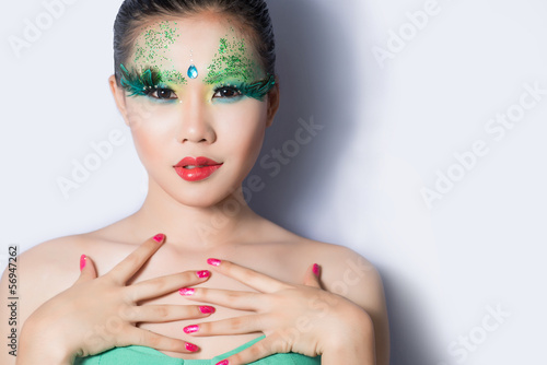 Photo: beautiful women with perfect art make up and long false eyelashe beautiful women with perfect art make up and long false eyelashe