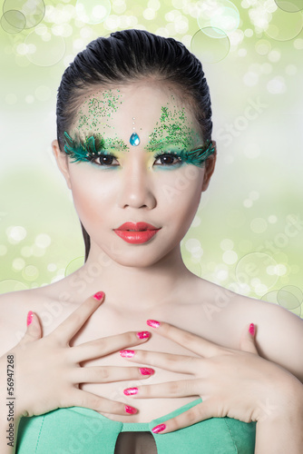 Photo: beautiful women with perfect art make up and long false eyelashe beautiful women with perfect art make up and long false eyelashe
