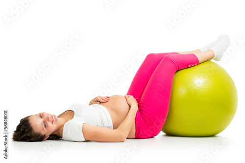 Photo: Pregnant woman excercises with gymnastic fit ball Pregnant woman excercises with gymnastic fit ball