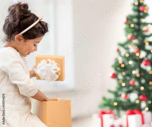 Photo: happy child girl with gift box happy child girl with gift box