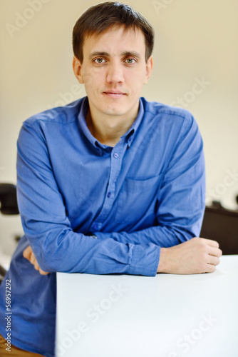 Photo: man in office man in office
