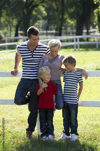 Photo: Young family enjoying the outdoors Young family enjoying the outdoors