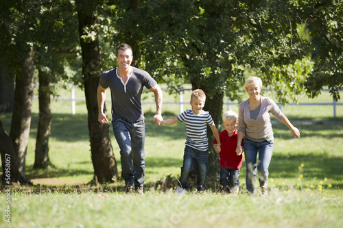 Photo: Young family enjoying the outdoors Young family enjoying the outdoors