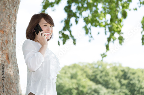 Photo: 電話をする女性 ビジネス 電話をする女性 ビジネス