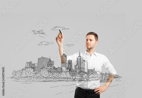 Photo: man drawing city man drawing city