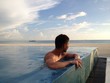 Man at beach pool Man at beach pool