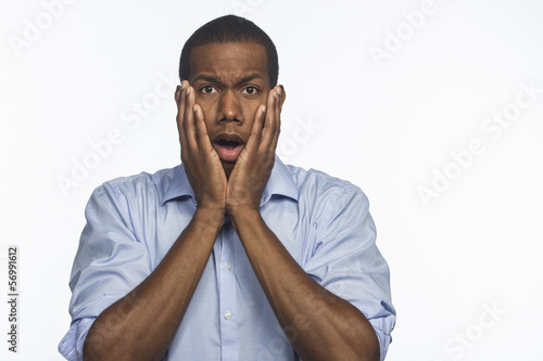 Photo: Young African American man surprised, horizontal Young African American man surprised, horizontal