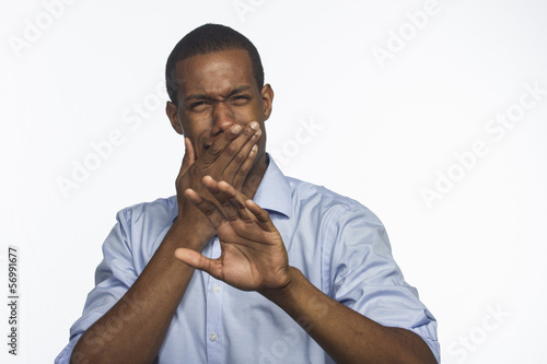Photo: African American man reacts in disgust, horizontal African American man reacts in disgust, horizontal