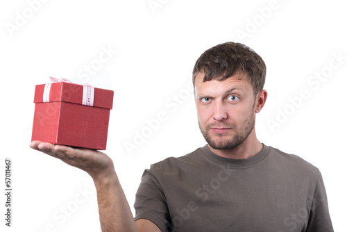 Photo: Bearded man with gift box on white background Bearded man with gift box on white background