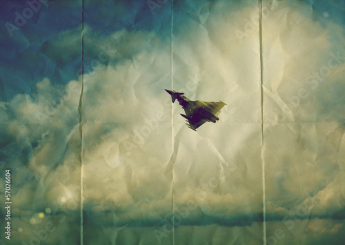 Photo: paper fighter jet paper fighter jet