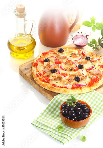 Photo: Pizza surrounded by the ingredients Pizza surrounded by the ingredients