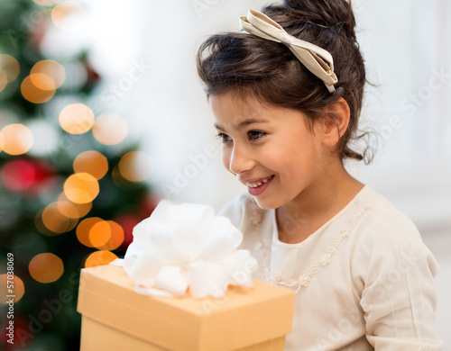 Photo: happy child girl with gift box happy child girl with gift box