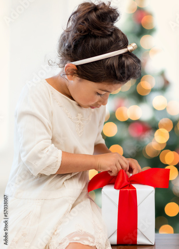 Photo: happy child girl with gift box happy child girl with gift box