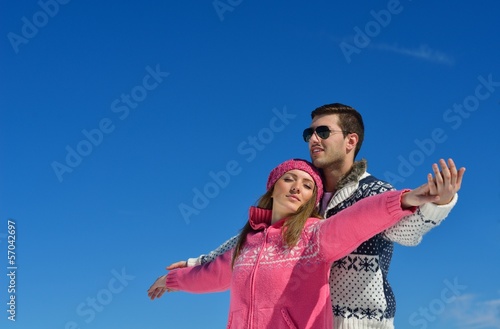 Photo: Young Couple In Winter Snow Scene Young Couple In Winter Snow Scene