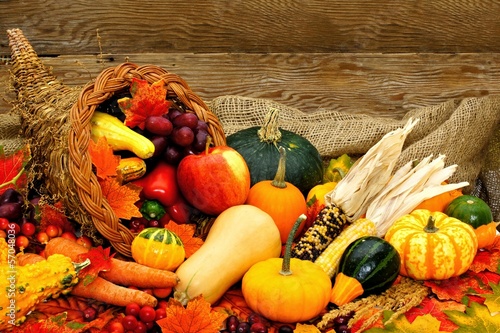 Photo: Harvest or Thanksgiving cornucopia filled with vegetables Harvest or Thanksgiving cornucopia filled with vegetables