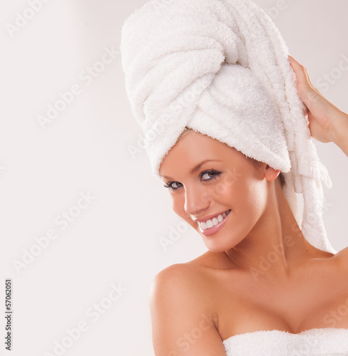Photo: Beautiful woman with her hair in a towel Beautiful woman with her hair in a towel