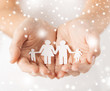 woman hands with paper man family woman hands with paper man family