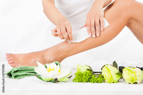 Photo: Woman Getting Legs Waxed Woman Getting Legs Waxed