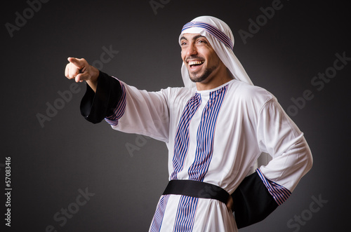 Photo: Arab in the dark room Arab in the dark room