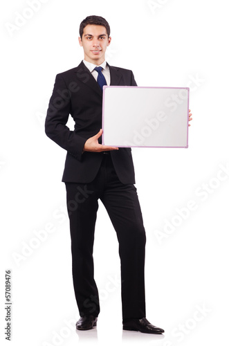 Photo: Young businessman with blank board Young businessman with blank board