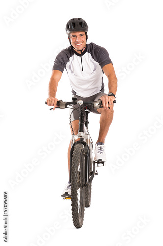 Photo: Young Male Cyclist On Bicycle Young Male Cyclist On Bicycle