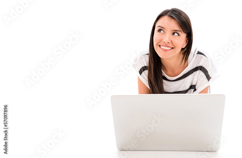 Photo: Thoughtful woman with a laptop Thoughtful woman with a laptop