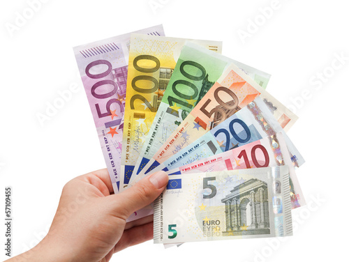 Photo: euro banknotes in hand on white euro banknotes in hand on white